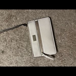 Cream Kate Spade wallet/clutch.